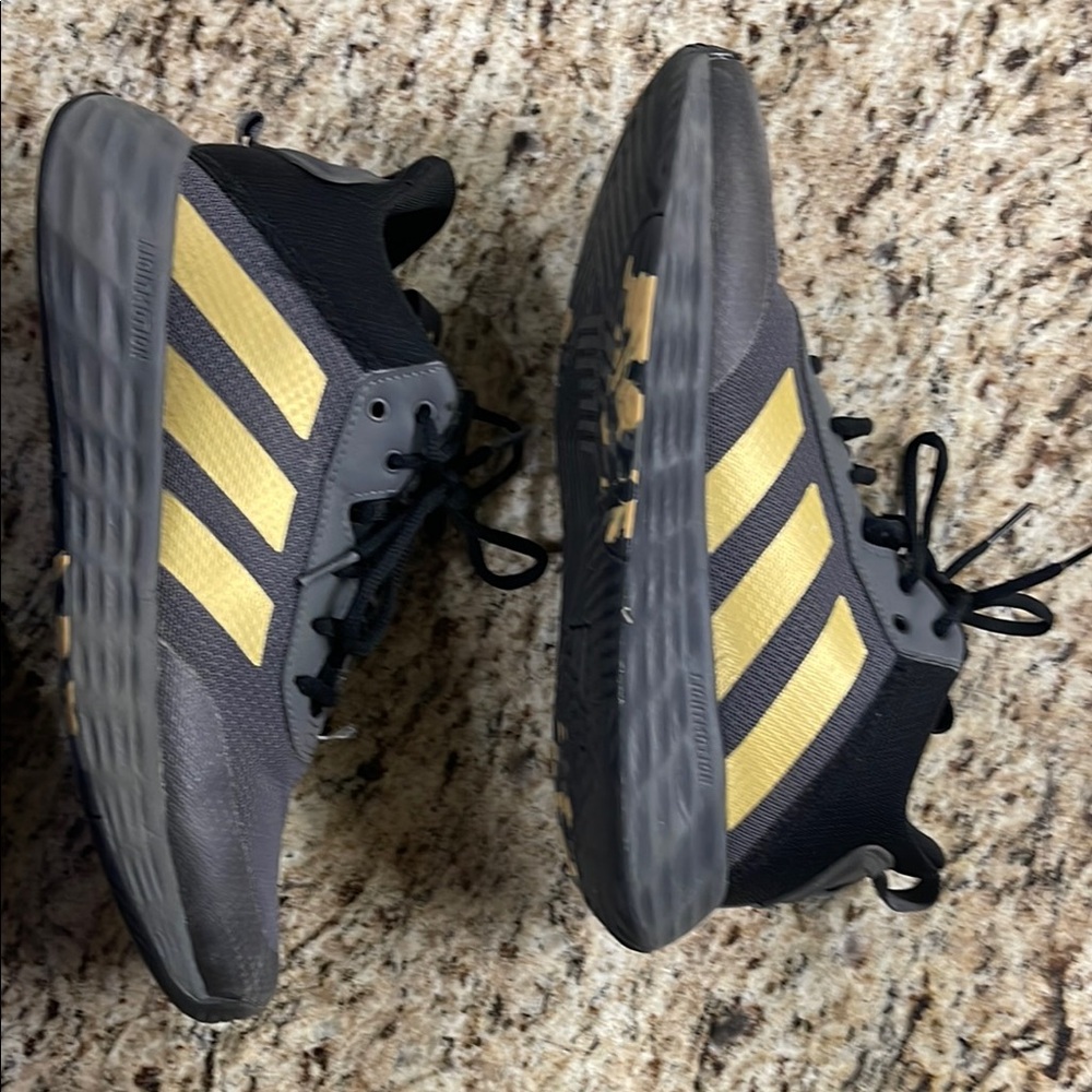 Men’s size 7 - Own the game 2.0 Adidas Men's Black and Gold Sneakers